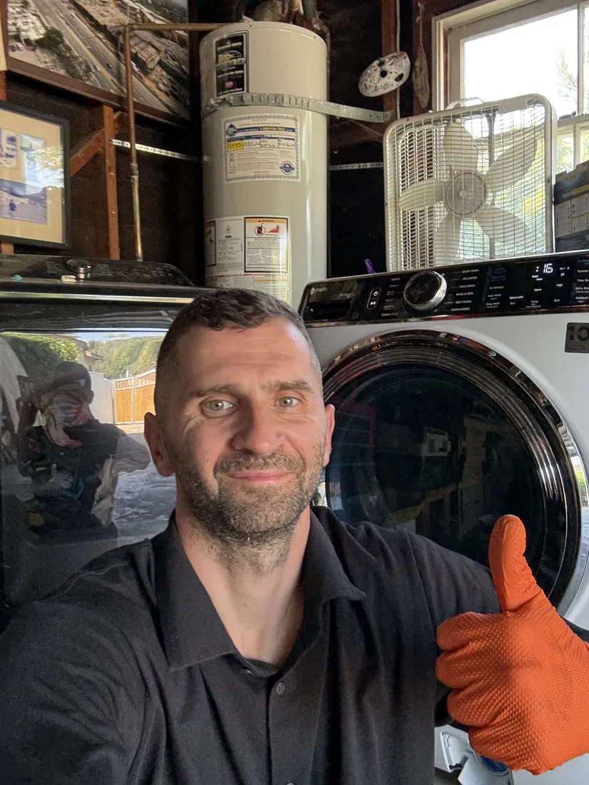 Technician completing a dryer repair in Del Mar